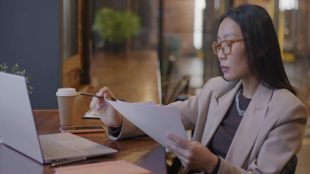Woman Working in a Coffee Shop