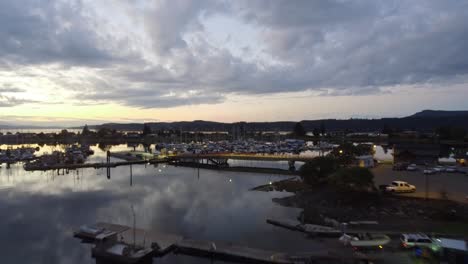 Boat-yard,-pier-and-sunset-aerial-shot-in-Bowser-BC