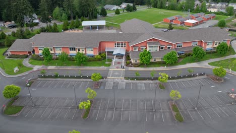 aerial of a vacant elementary school during the summer