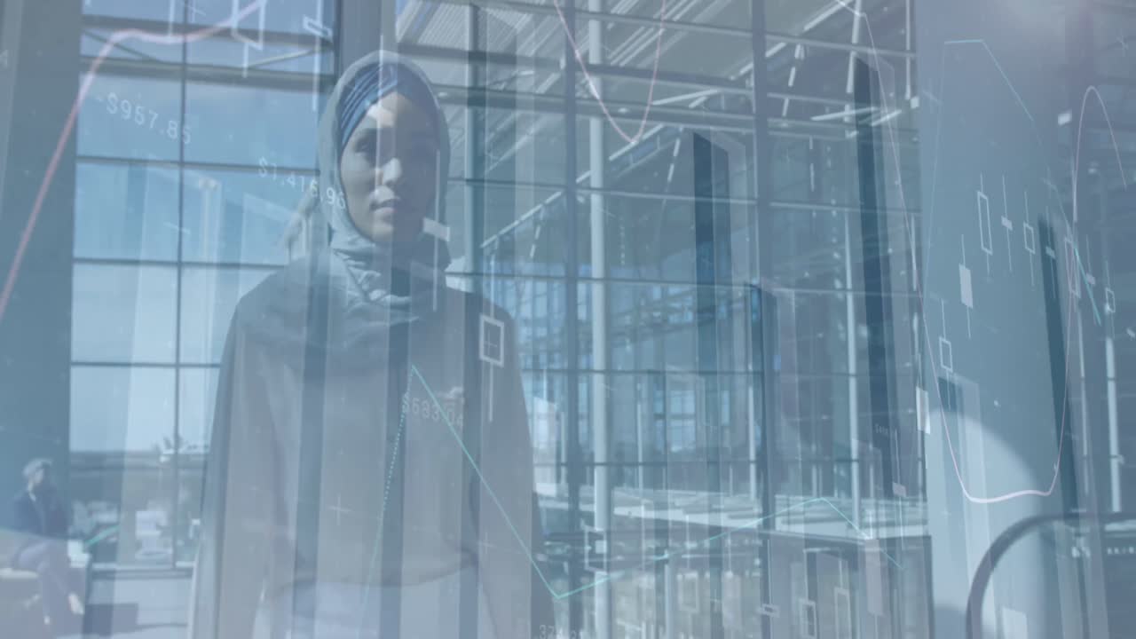 animación de gráficos financieros sobre una mujer de negocios biracial en hijab caminando en la oficina