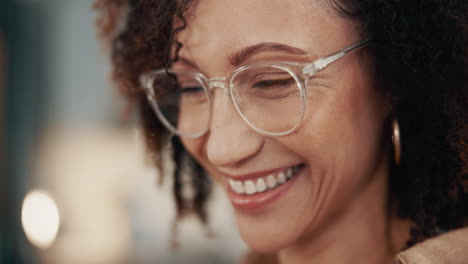 smiling woman in glasses