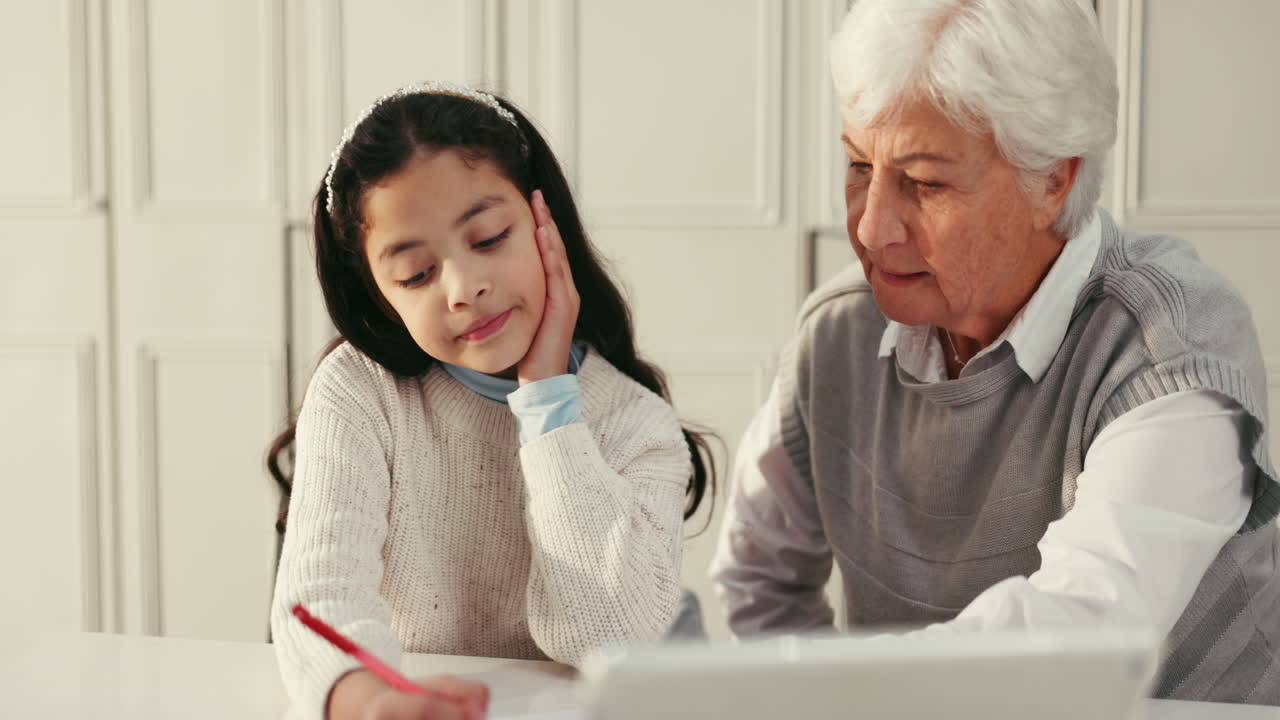 Grandmother Helping Grandchild with Homework