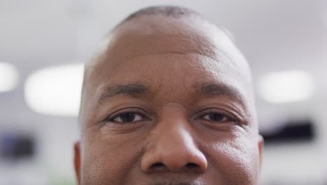 Portrait-of-african-american-businessman-in-office,-slow-motion