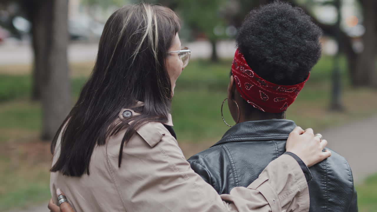 Lesbian Couple Hugging in Park