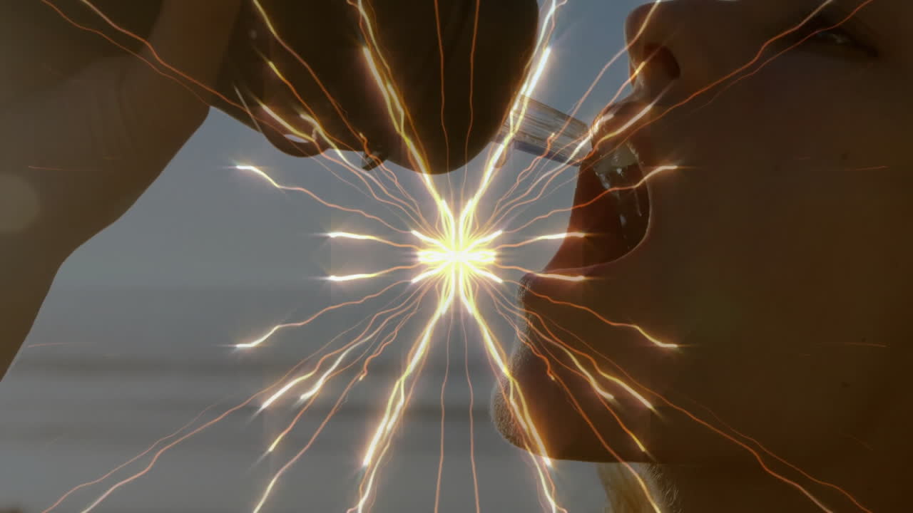 Woman drinking water outdoors for health, showing golden light rays radiating around water stream
