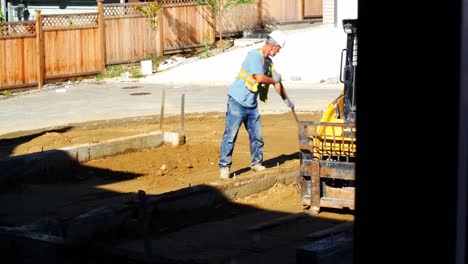 engineer leveling ground with shovel