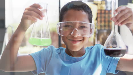 In-a-school-environment,-a-young-African-American-girl-smiles-warmly