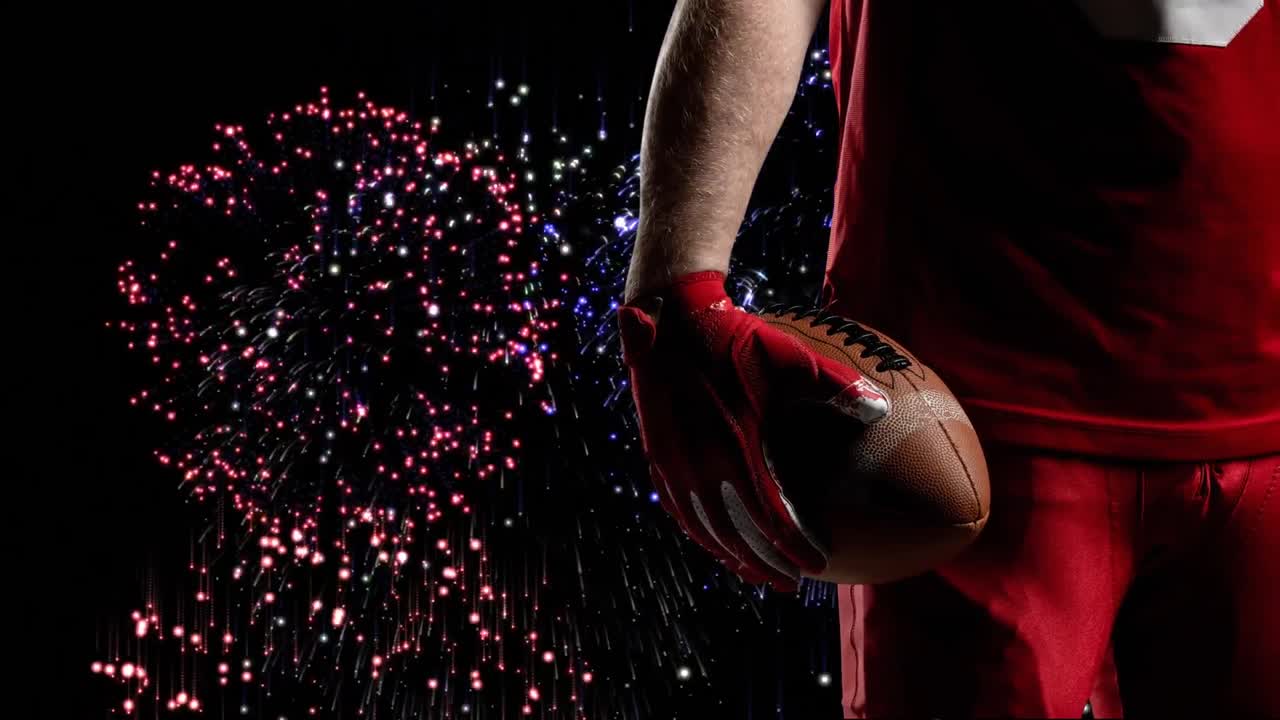 Animazione della parte centrale di un giocatore di football americano su fuochi d'artificio su sfondo nero