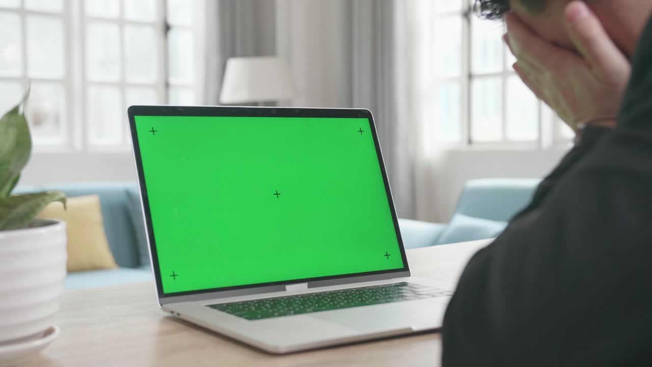 Asian Businessman Wearing Business Suit With Green Screen Computer Being Tired Due To Hard Work While Working At Home.
