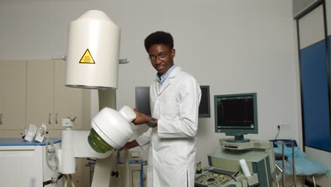medical professional operating x-ray equipment