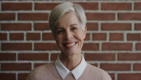 portrait beautiful middle aged woman smiling enjoying happy successful lifestyle stylish elegant senior female looking cheerful slow motion