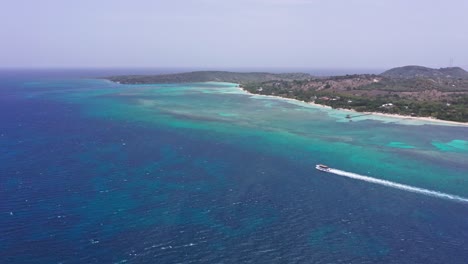 boat cruising at playa la ensenada,punta rucia , dominican republic