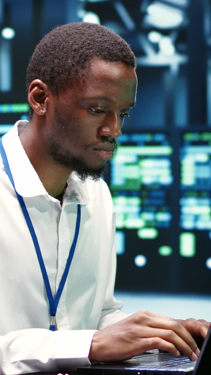 Vertical video IT developer repairing server