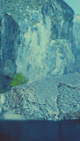 rocky cliff overlooking a calm ocean