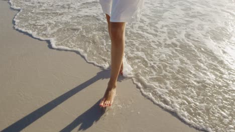 young woman by the sea