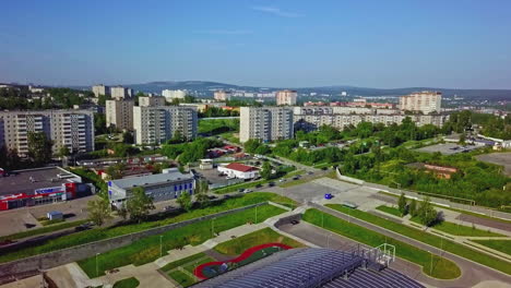 aerial view of a city with apartment buildings and parks