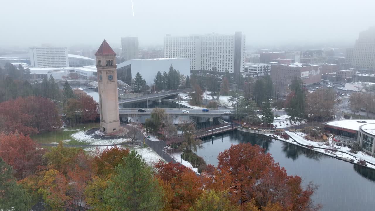 Aerial view of Spokane, Washington's riverfront park while a light layer of rain falls from the sky
