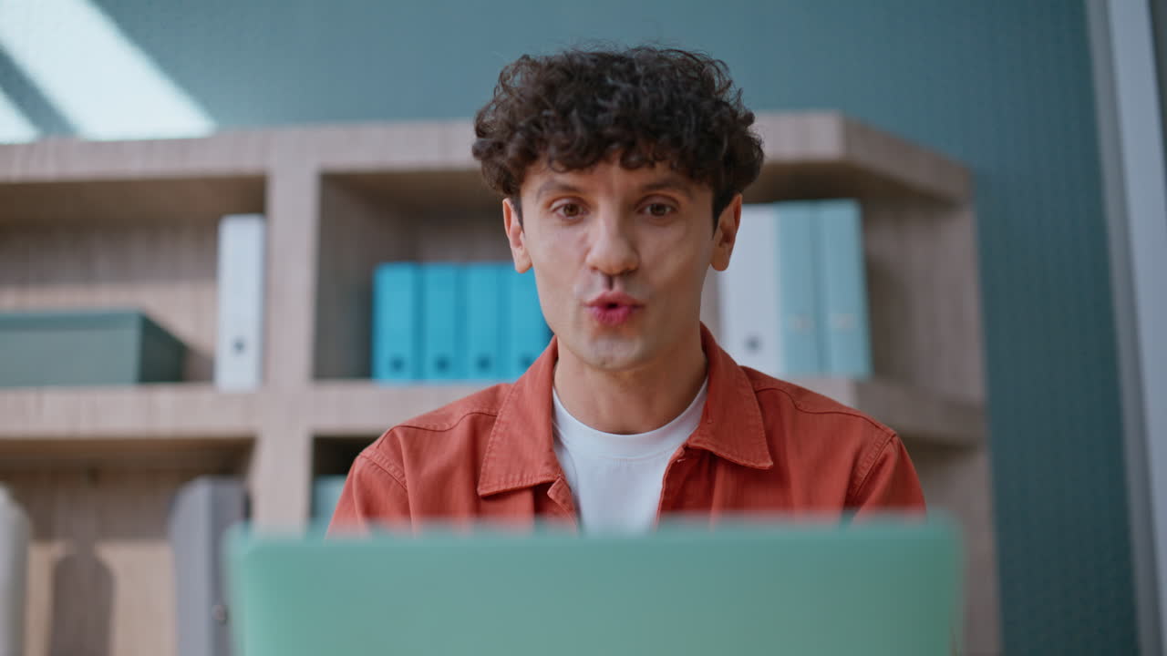 Employee discussing project video call talking to laptop closeup. Inspired man