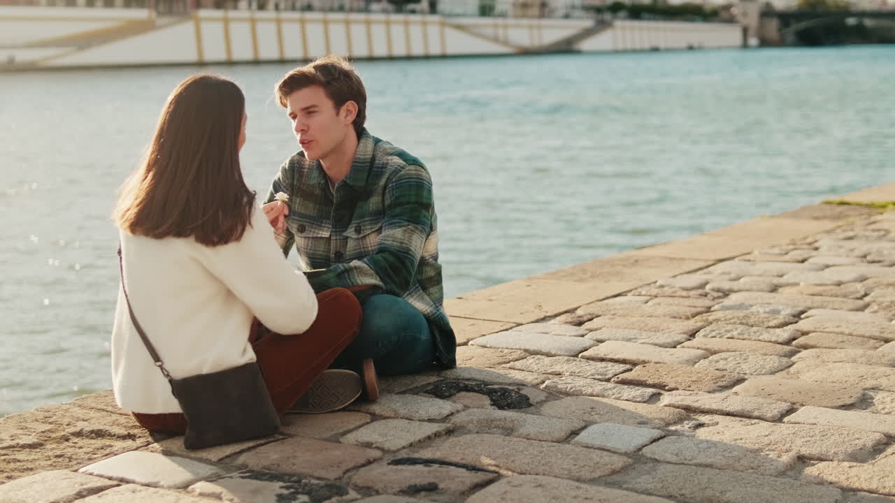 Young Couple by the River in Seville