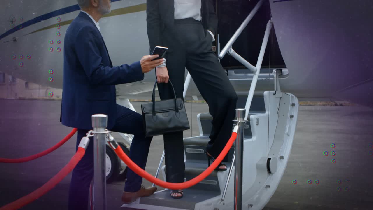 Senior man holding smartphone, showing boarding info to exec on jet stairs, graphics moving around