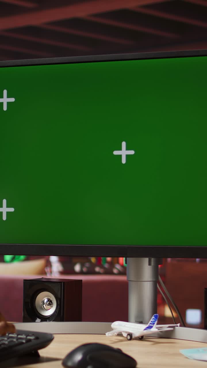 Vertical video Woman at home using green screen PC during job shift, analyzing data