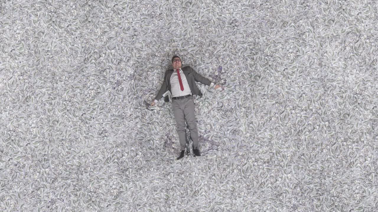 행복한 사람 사업가 은행권에서 눈 천사를 묘사합니다.