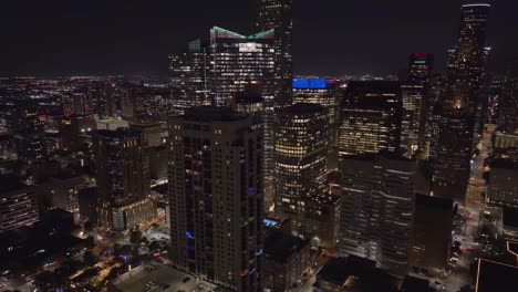 aerial view overlooking luxury residence roofs, dusk in houston, usa - circling, drone shot