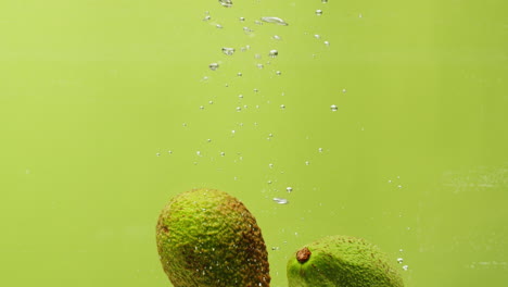 avocados in water with bubbles