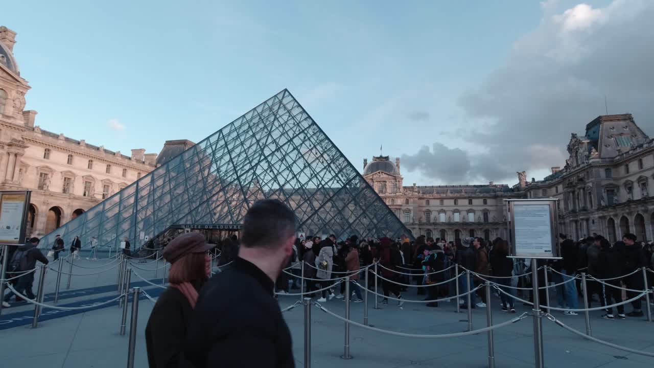Shot of people queuing out of the museum in slow motion