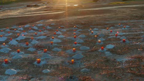 Pots-are-set-for-dynamite-blasting-of-granite-rock-at-excavation-site