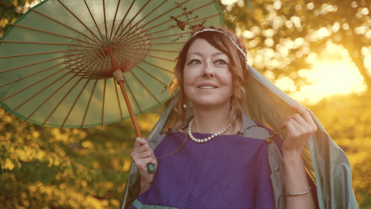 Woman in historical costume with umbrella