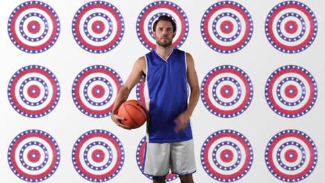 jugador de baloncesto masculino caucásico sosteniendo baloncesto contra múltiples estrellas en círculos giratorios