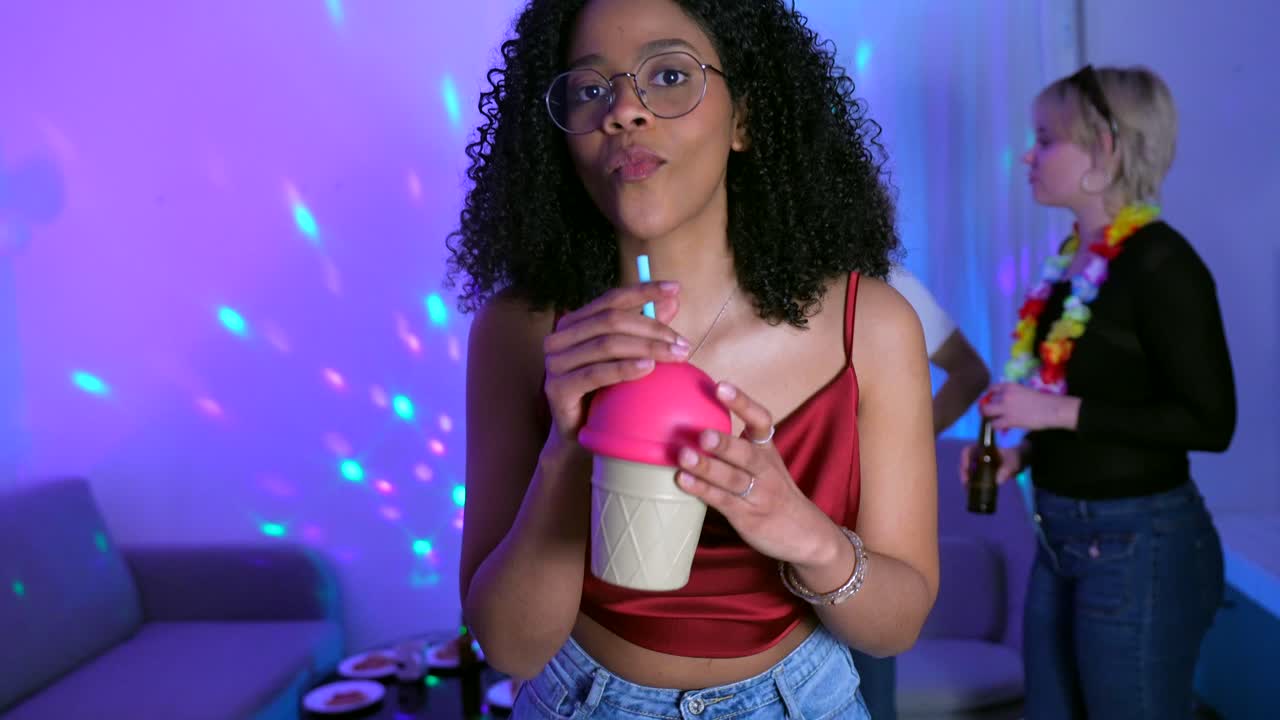 Young Women Enjoying a Fun Party with Disco Lights