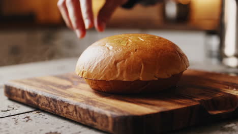 preparing a burger bun