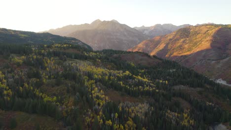 american fork canyon mountain pass landscape in autumn sunset, drone