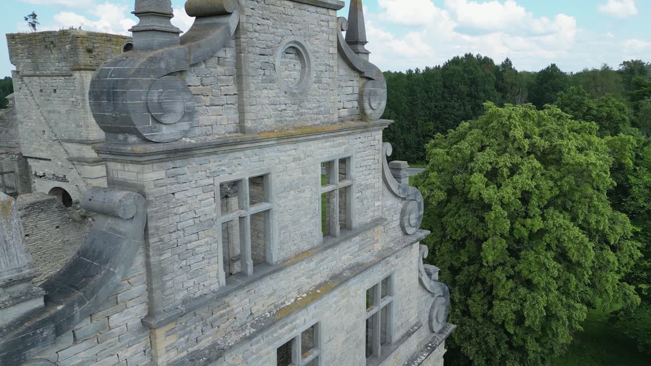 Aerial orbits thick stone walls of ruined castle at Haapsalu, Estonia