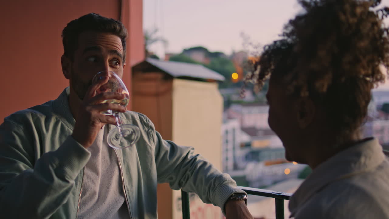 Carefree friends enjoying evening closeup. Couple spending time together talking