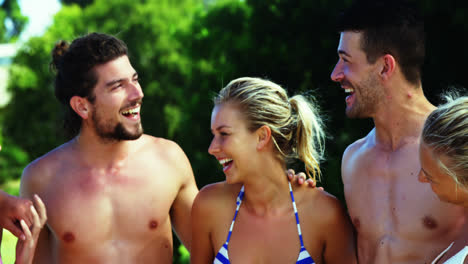 Group-of-friends-having-fun-near-poolside