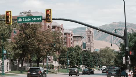 A-static-shot-of-highway-in-Salt-Lake-City-with-snow-covered-mountains-in-the-background-in-day-time