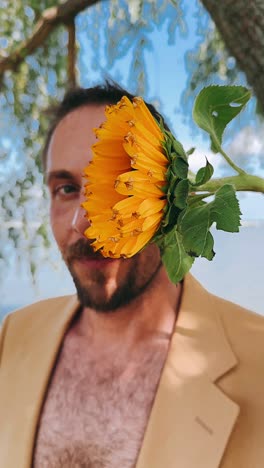 man with a sunflower