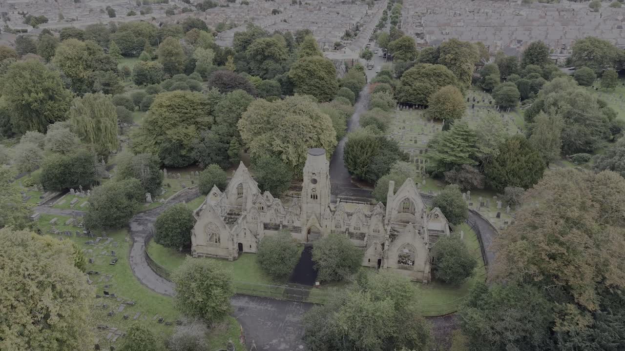 Flaybrick Memorial Gardens - place of mythical legends and ghost stories - drone clockwise rotate and move in fast from far - Wirral, UK