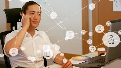 animation of network of connections over asian businessman using smartphone