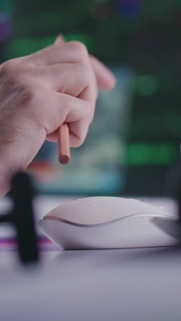 person coding at desktop