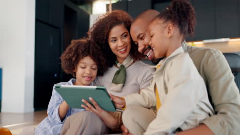 happy family using a tablet together