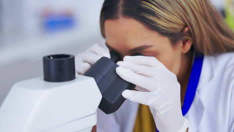 Woman,-scientist-with-microscope