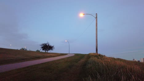 skyline with grass with moon in evening pan calgary alberta canada