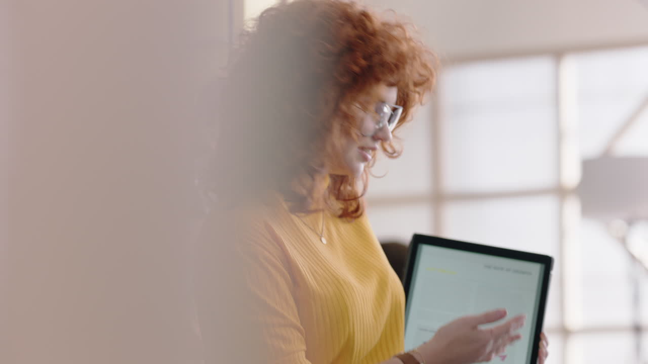 young business people brainstorming redhead team leader woman using tablet computer presenting ideas students discussing market data in diverse office