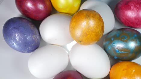 colored eggs rotate in a basket