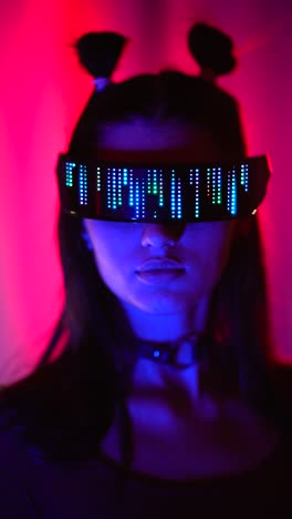 person wearing vr headset with glowing lights