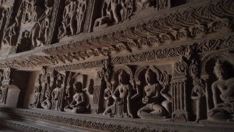 ancient temple carvings with monks
